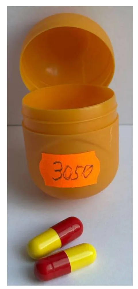Two yellow-and-red Palbocib capsules submitted for testing as sample 3050